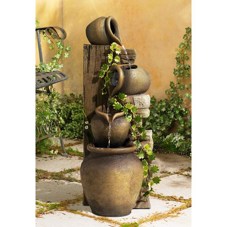 Image 1 John Timberland Cascading 33" High Four Jugs Rustic Fountain in scene
