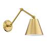 Regent Modern Gold Adjustable Swing Arm Wall Lamp in scene