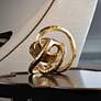 Regina Andrew Design 7" High Knot Gold Tabletop Sculpture in scene
