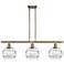 Rochester 36"W 3-Light Antique Brass Stem Island Light w/ 8" Clea