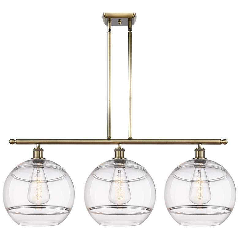 Image 1 Rochester 38.5"W 3-Light Antique Brass Stem Island Light w/ Clear Shad