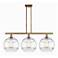 Rochester 38.5"W 3-Light Brushed Brass Stem Island Light w/ Clear Shad