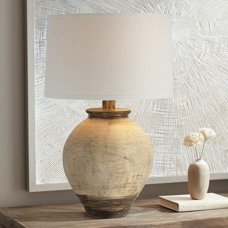 Image 1 Ryker Distressed Brown Hydrocal Urn Table Lamp