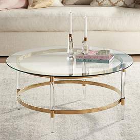 Image1 of Saarinen 38" Wide Gold and Glass Coffee Table