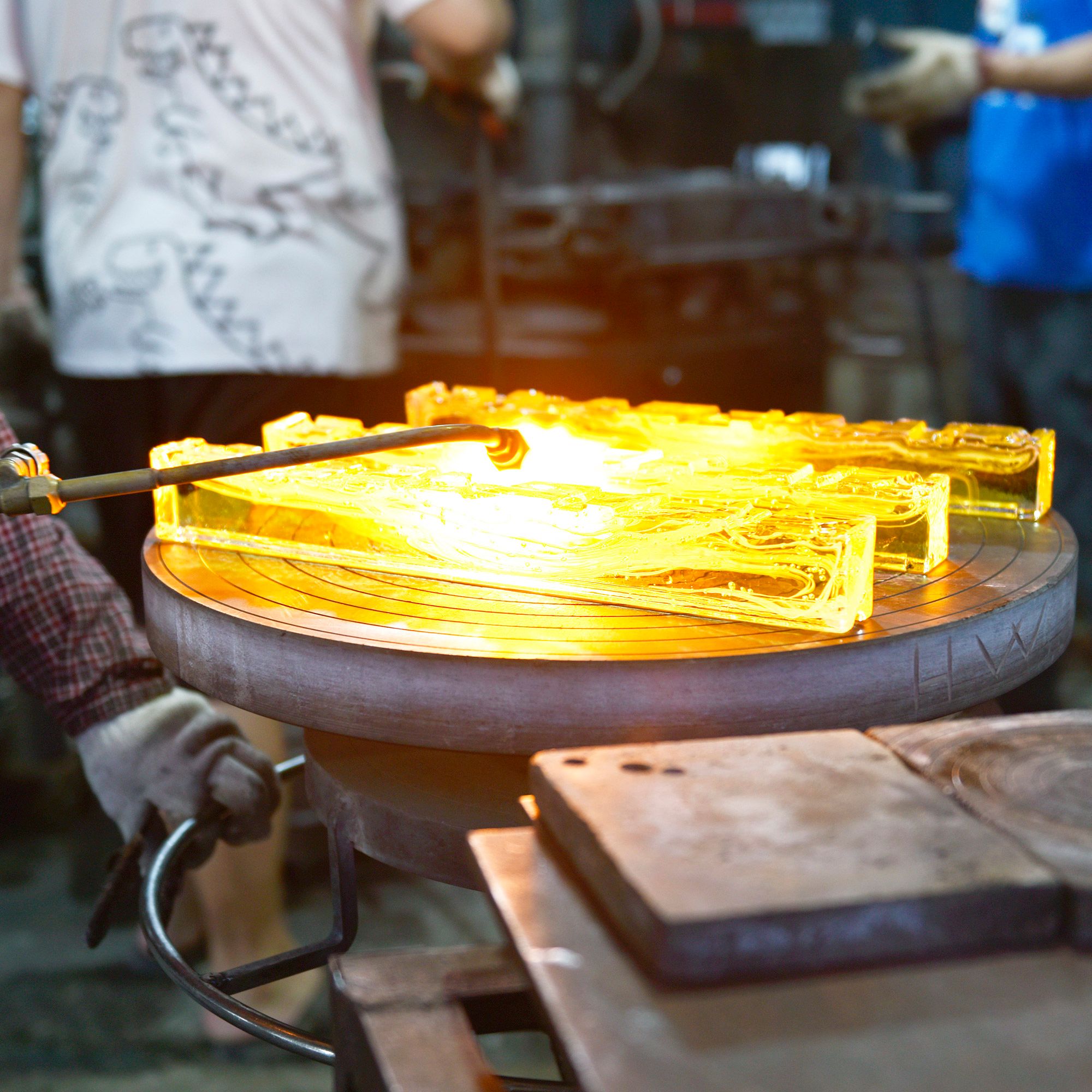 Saber Integrated LED 50in Brass Chandelier with Handcrafted Glass