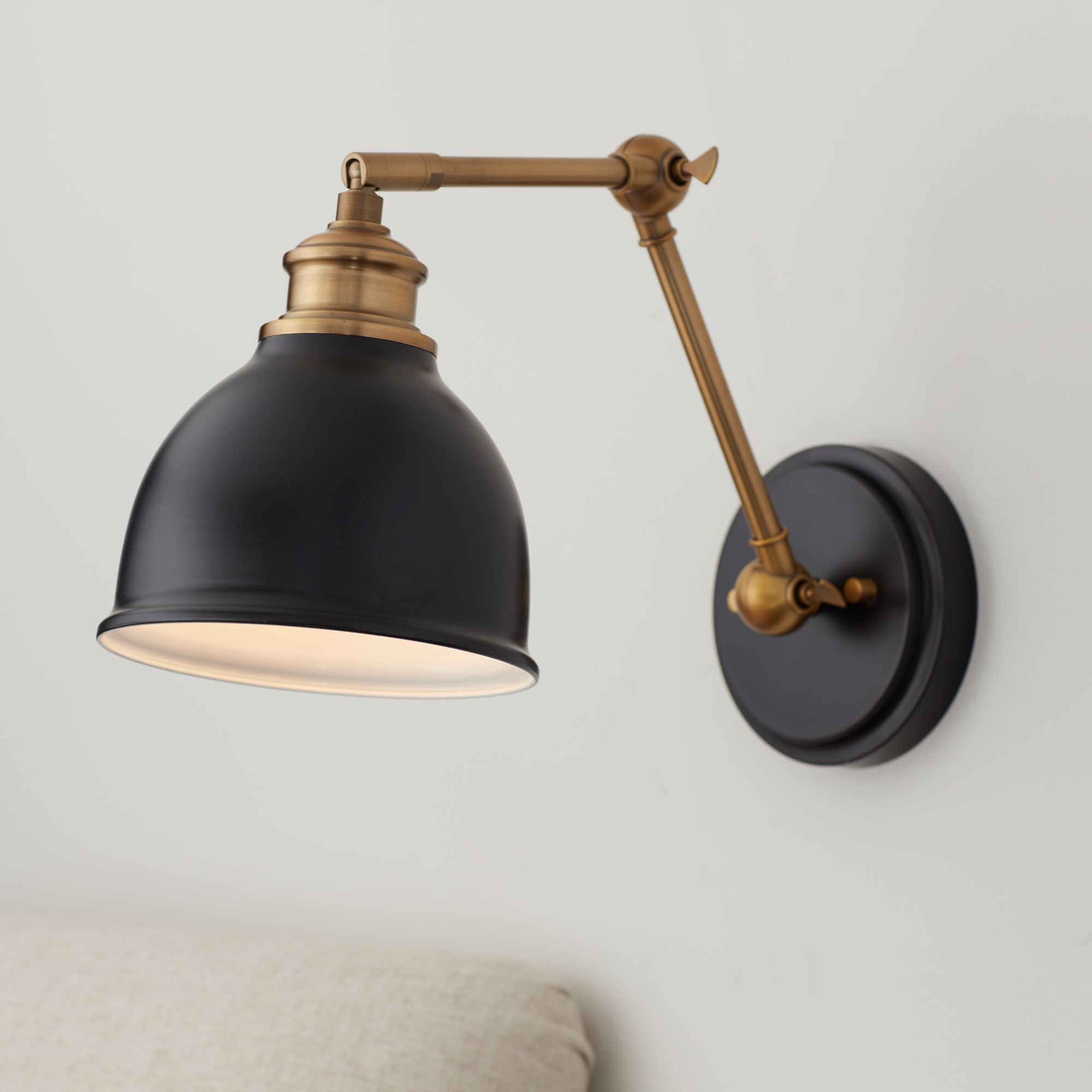 black swing wall light