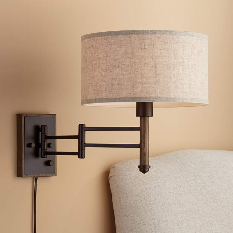Image 1 Sitka Bronze and Wood Plug-In Swing Arm Wall Lamp