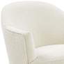 Skyla Luxe Cream Boucle Swivel Chair in scene