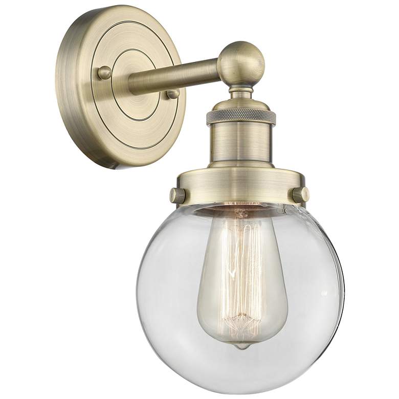 Image 1 Small Beacon 10"High Antique Brass Sconce With Clear Shade