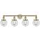 Small Beacon 33.5"W 4 Light Antique Brass Bath Light With Clear Shade