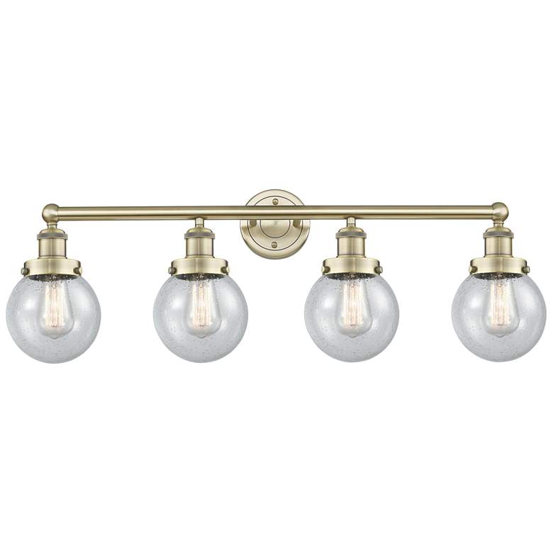 Image 1 Small Beacon 33.5"W 4 Light Antique Brass Bath Light With Seedy Shade
