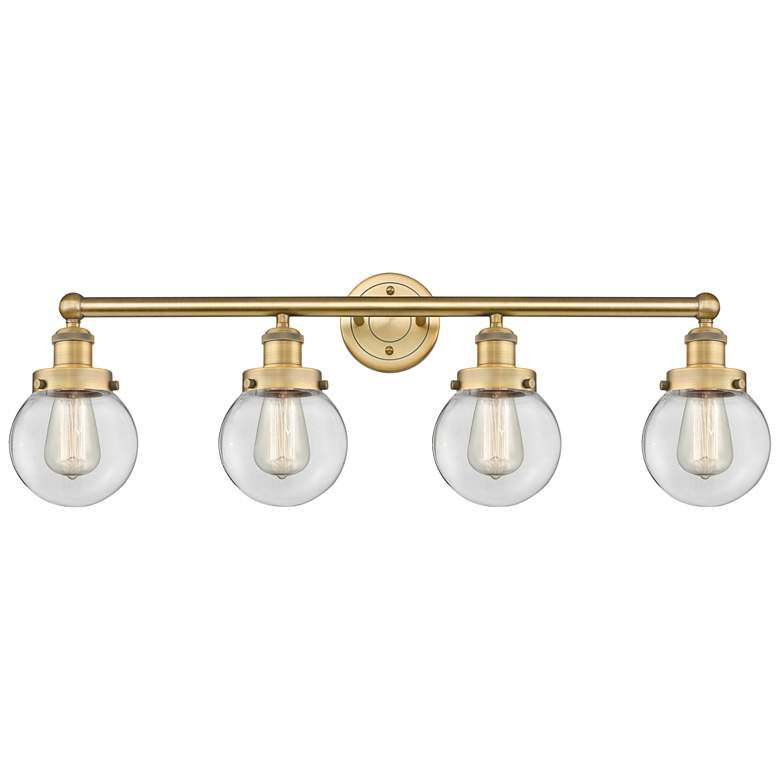 Image 1 Small Beacon 33.5"W 4 Light Brushed Brass Bath Light With Clear Shade