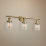 1_Small Bell 30" Wide Clear Glass - Brushed Brass Bath Light