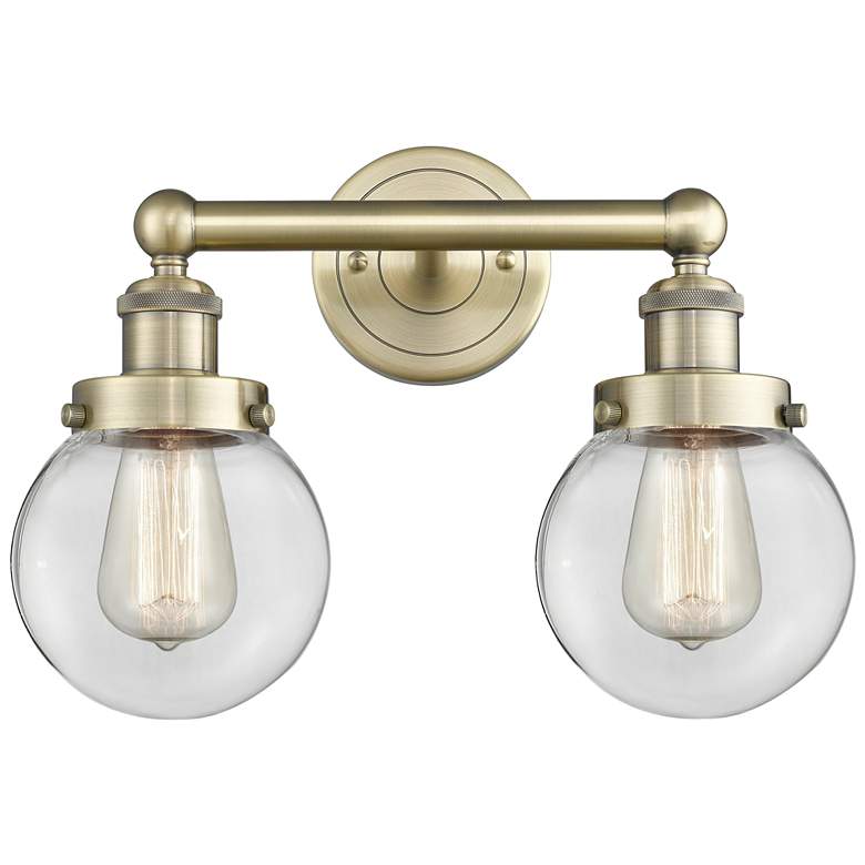Image 1 Small Edison Beacon 15.5 inchW 2 Light Antique Brass Bath Light w/ Clear S