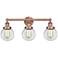 Small Edison Beacon 24.5"W 3 Light Copper Bath Light With Clear Shade
