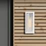 Smyth 6" Wide Outdoor Wall Light in Natural White with Seeded Glass in scene