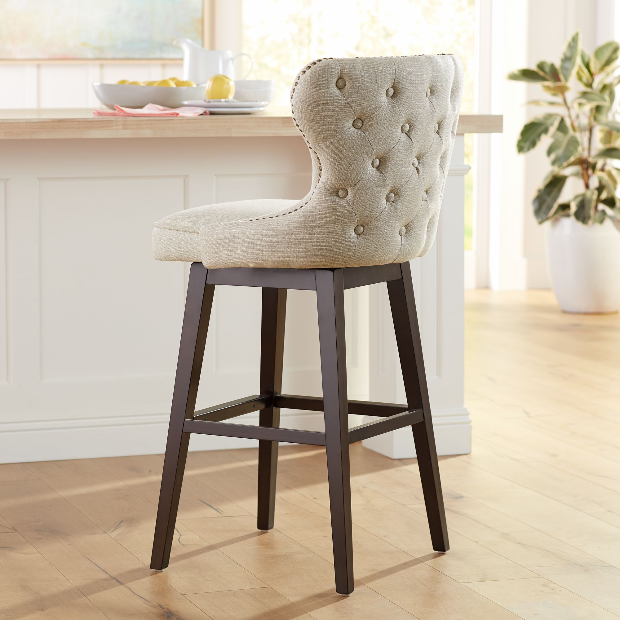 Sunpan Ariana 29 1/2" Sand Fabric Tufted Swivel Bar Stool