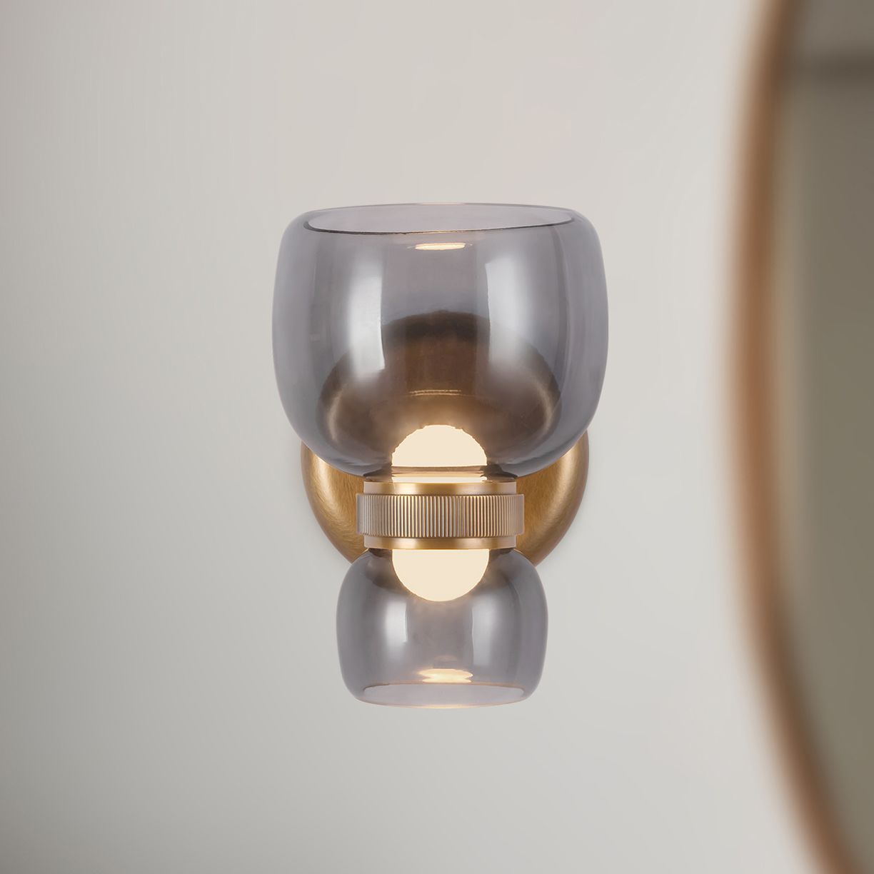 Sutton 8-in Vintage Brass dimmable LED Wall/Vanity Light with Smoked Glass