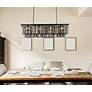 Sydney 50"W Matte Black and Silver Crystal Linear Chandelier in scene