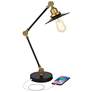 Taurus Black and Gold Adjustable Desk Lamp with USB Port in scene
