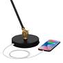 Taurus Black and Gold Adjustable Desk Lamp with USB Port in scene