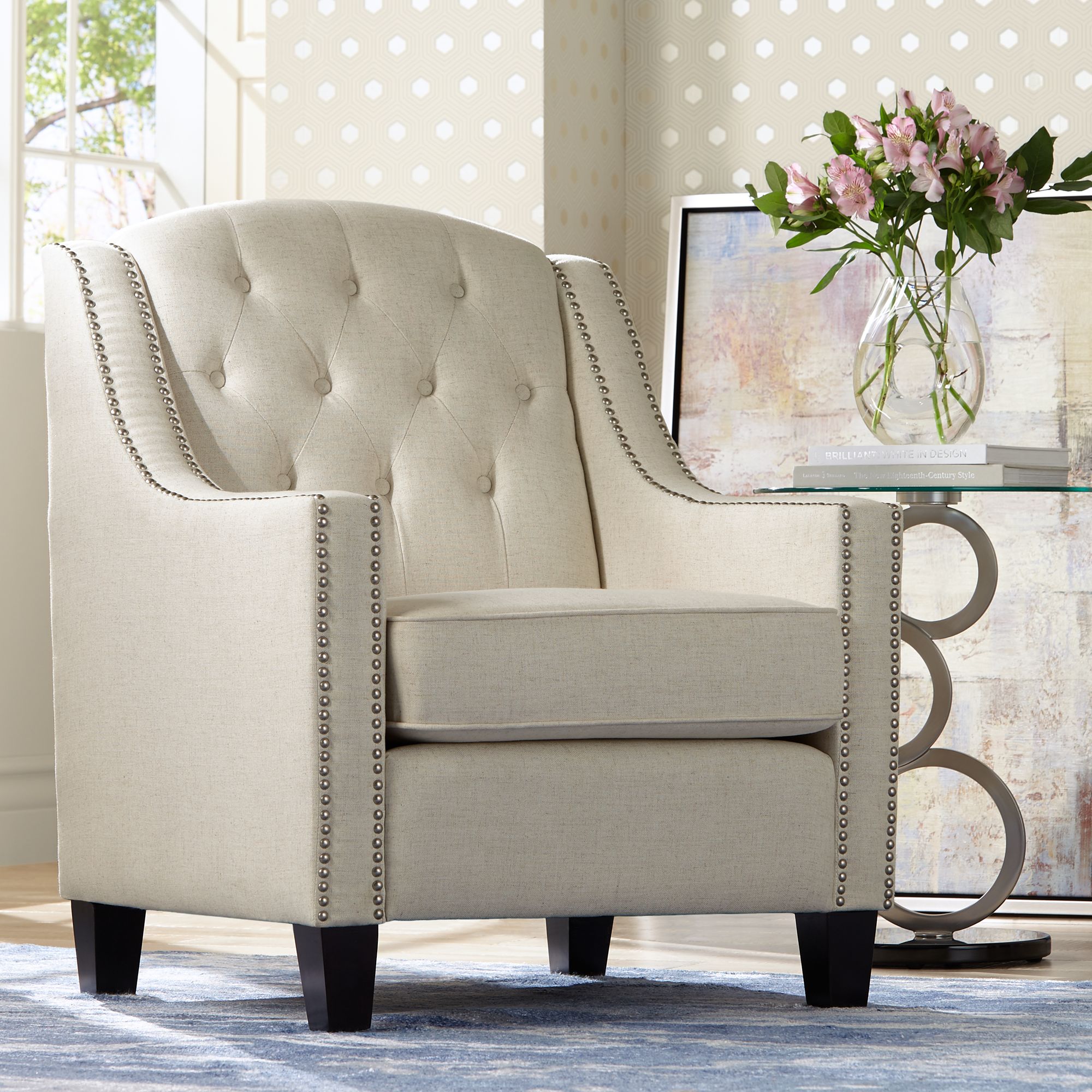 white tufted armchair