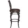 Trevi 26 1/2" Wood and Bronze Metal Scroll Back Swivel Counter Stool in scene