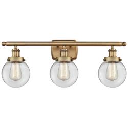 Urban Beacon 26"W Brass 3-Light Bath Light with Clear Glass