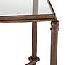 Uttermost 25" Wide Warring Rustic Bronze and Glass End Table in scene