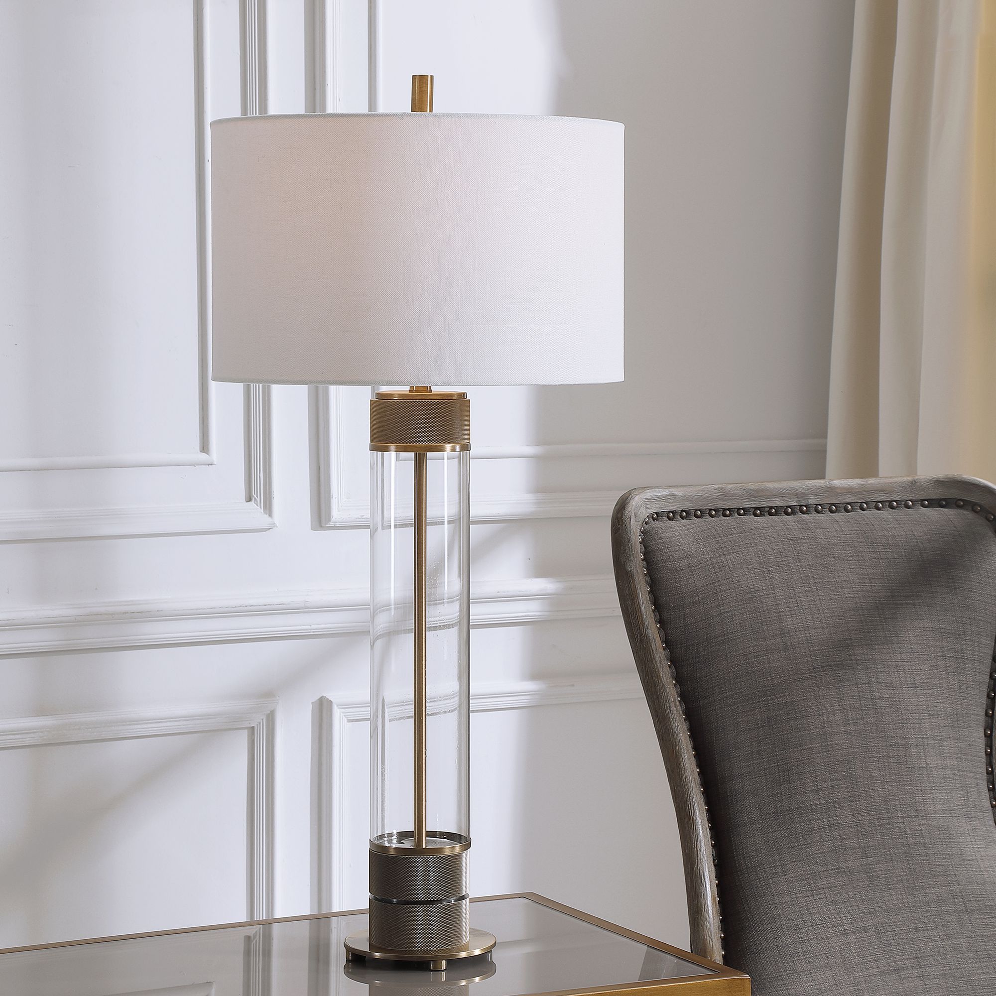 brass and clear glass table lamp