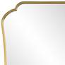 Uttermost Athena Brushed Brass 24" x 32" Curved Wall Mirror in scene