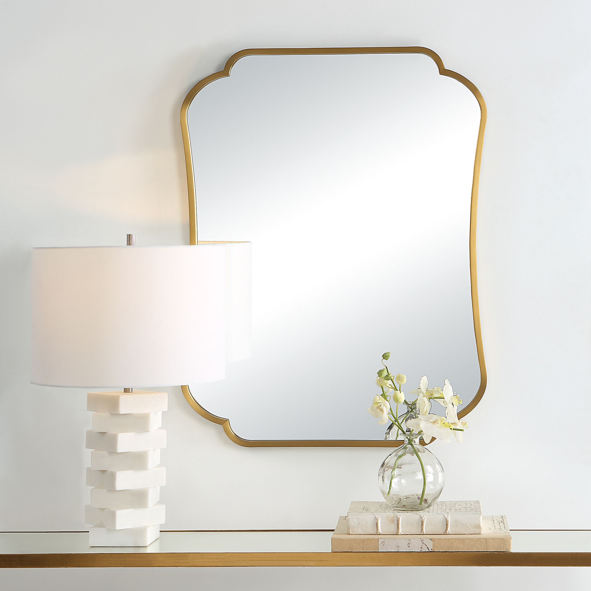 Uttermost Athena Brushed Brass 24" x 32" Curved Wall Mirror in scene