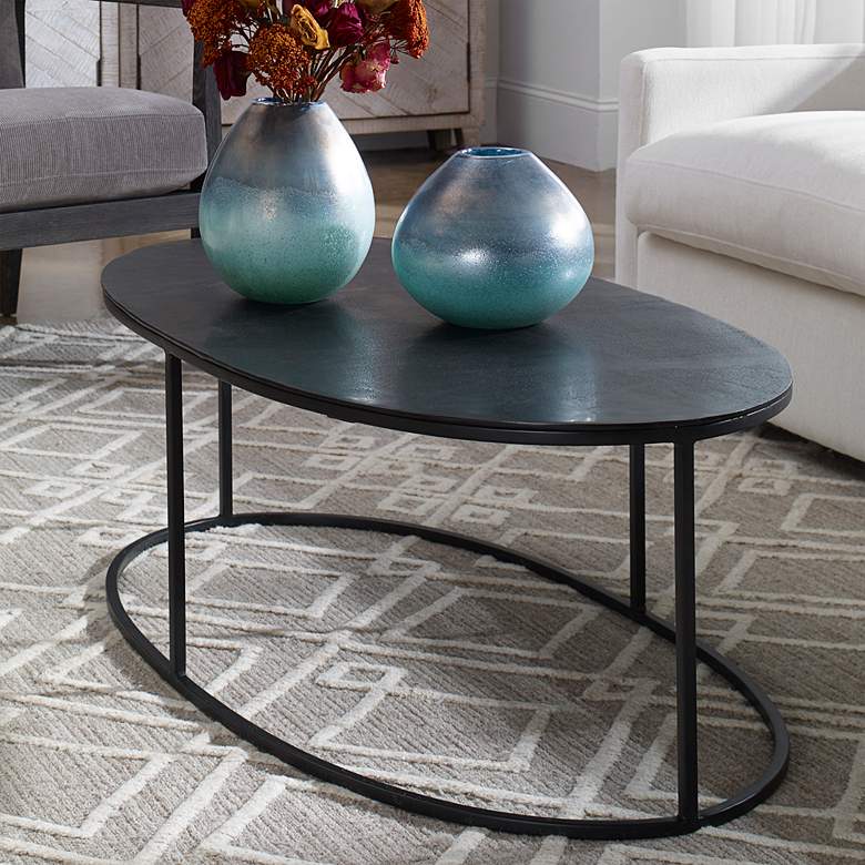 Uttermost Coreene 48&quot; Wide Oval Aged Black Iron Coffee Table
