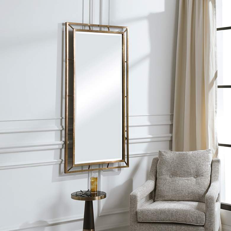 Image 1 Uttermost Farrow Brass Iron 28" x 56" Framed Wall Mirror