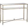 Uttermost Henzler Glass and Gold Leaf Console Table in scene