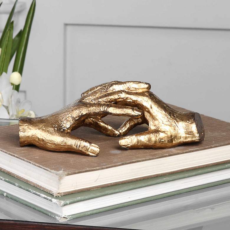 Image 1 Uttermost Hold My Hand 9" Wide Antique Gold Leaf Figurine