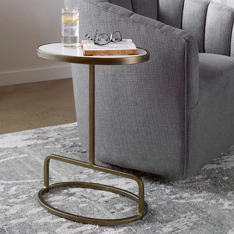 Image 1 Uttermost Jessenia 18" Wide Antique Gold Oval Accent Table