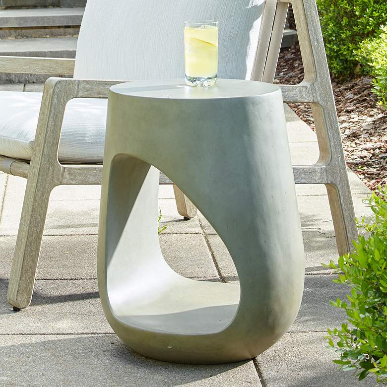 Image 1 Uttermost Lithos 23" H x 18" W Warm Gray GRC Outdoor Accent Table