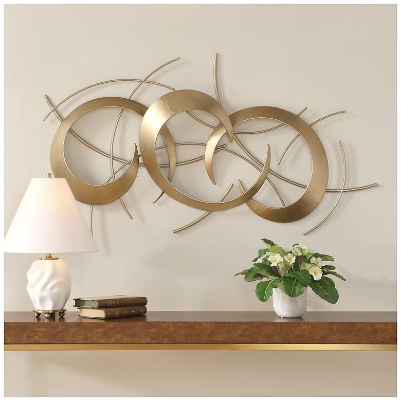 Image 1 Uttermost Motivate 42" Wide Gold Metal Wall Decor