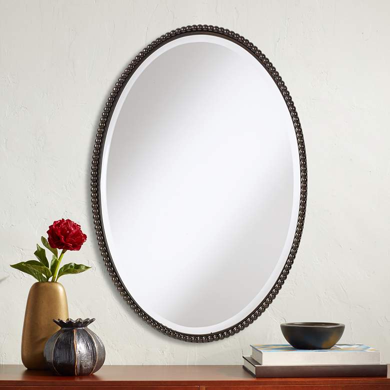 Image 1 Uttermost Sherise Bronze 22" x 32" Oval Wall Mirror
