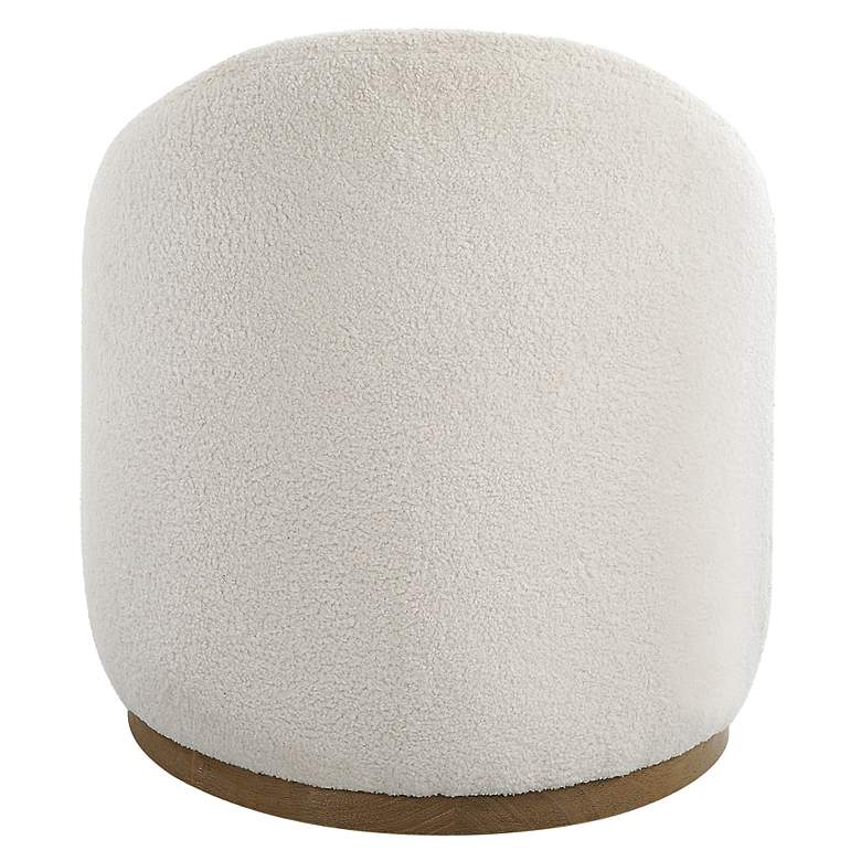 Image 6 Uttermost Swirl Natural Faux Sheepskin Swivel Ottoman more views