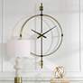 Uttermost Time Flies Brushed Brass 48 3/4" High Wall Clock in scene