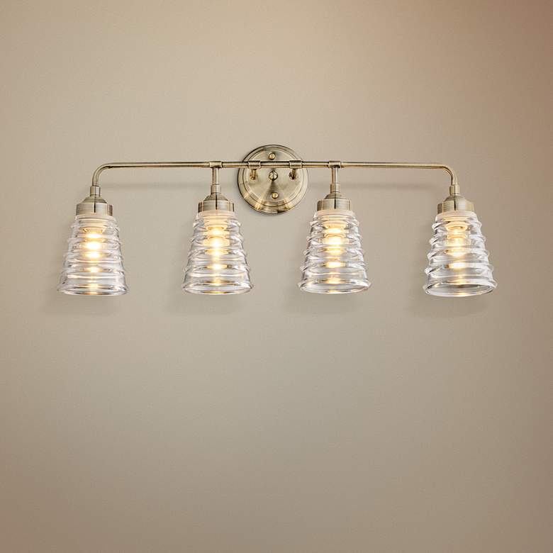 Image 1 Varaluz Amherst 29" Wide 4-Light Antique Brass Bath Light