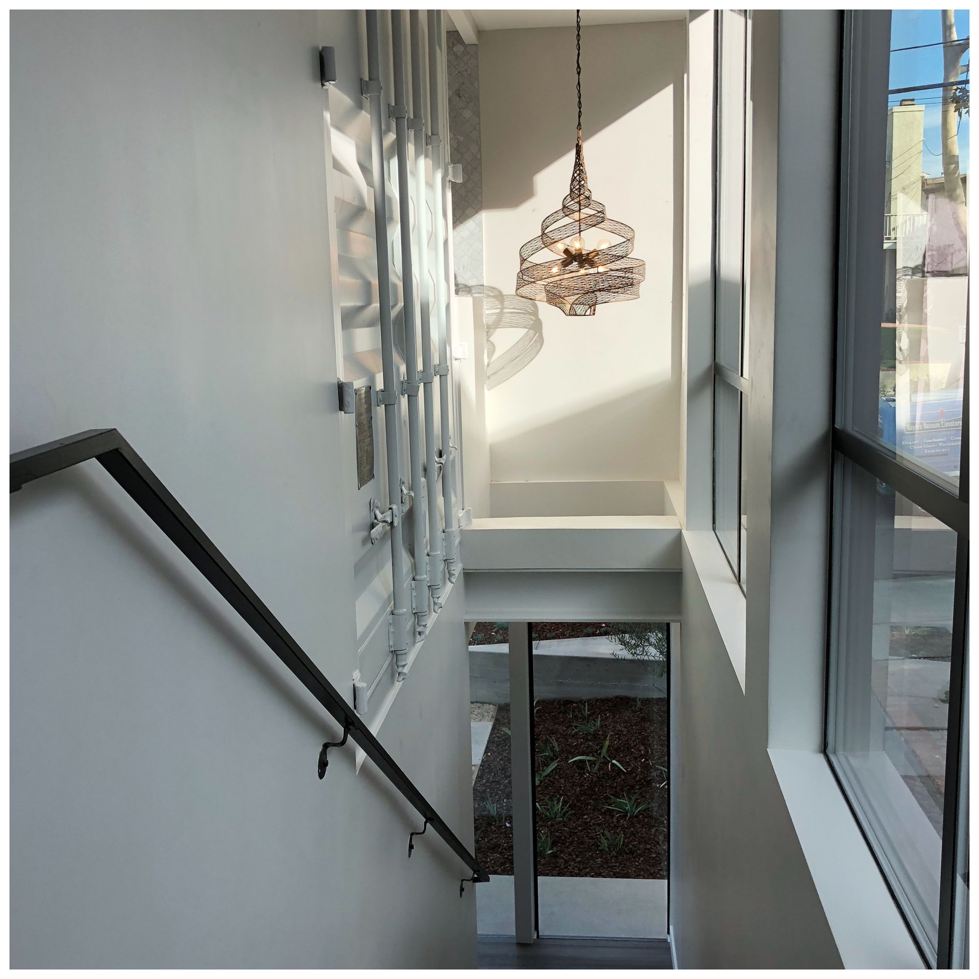 Varaluz Flow 26" Wide Hammered Ore Twist 6-Light Modern Pendant