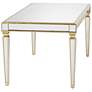 Veronica 71" Wide Gold Leaf and Mirror Dining Table in scene