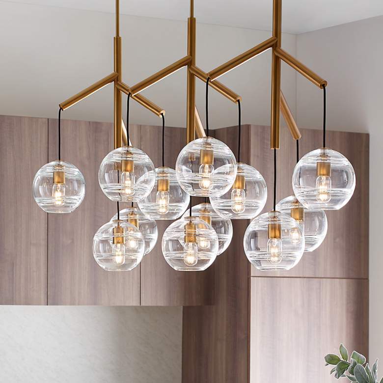 Image 1 Visual Comfort Sedona 62"W Aged Brass 12-Light Chandelier