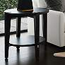 Whitfield 24" Black Round End Table in scene