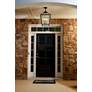Woodstock 23 1/2" High Black 4-Light Outdoor Wall Light