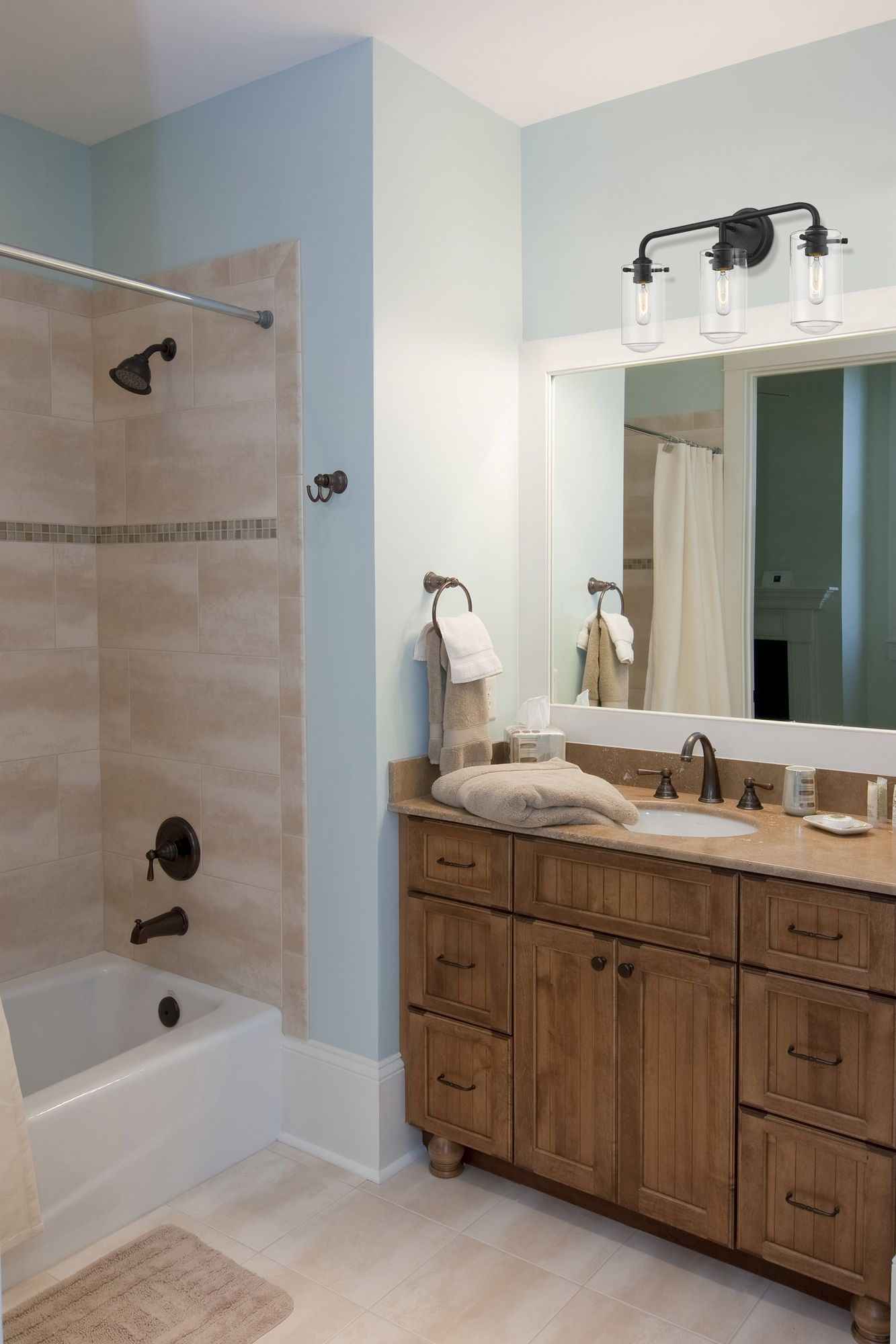 Z-Lite Delaney 22" Wide High Matte Black 3-Light Bath Light in scene