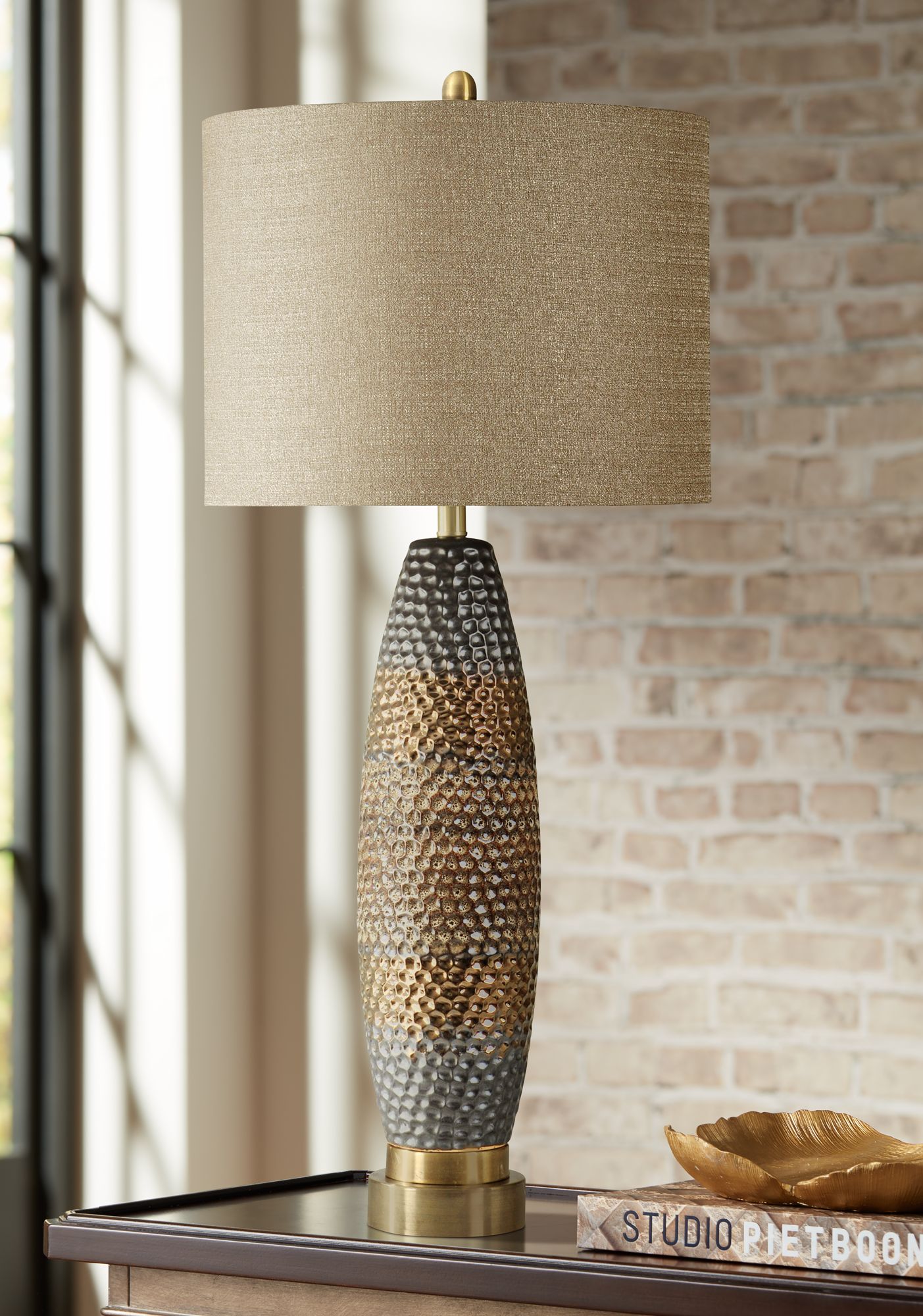 gold and grey table lamp